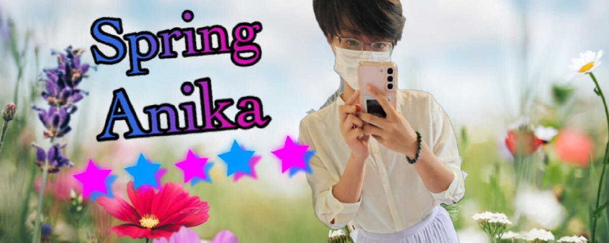 A 5-star banner with the text "Spring Anika" on the left and five stars in pink, blue, and purple. An image of anika, a thin, light-skinned brown person, is on the right. They're wearing a cream blouse, lavender skirt, and white mask as they take a selfie.